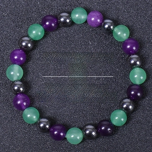 Detail of 8mm amethyst and hematite beaded bracelet for anxiety and stress relief