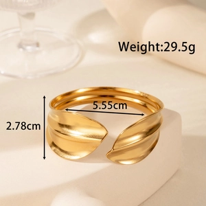 Adjustable golden stainless steel cuff bracelet with a wrinkled leaf-inspired texture
