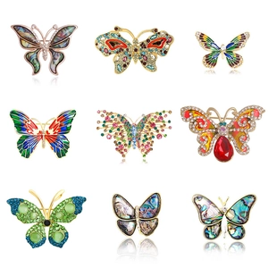 Elegant collection of butterfly brooches with enamel and sparkling rhinestones