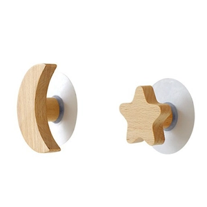 Star and moon shaped solid beech wood wall hooks in natural finish on white background
