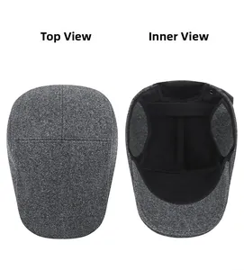 Detail view of winter flat cap showing the wool blend fabric texture and inner lining