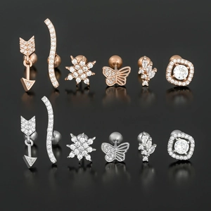 12-piece geometric stud earring set in rose gold and silver with zircon butterfly designs