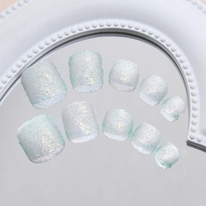 Sparkly mint green press-on toenails with glitter finish and Aurora shimmer 10pcs set