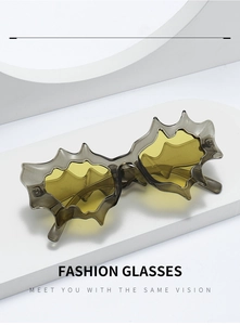 Detail view of irregular wavy frame sunglasses with CE certification mark on the temple