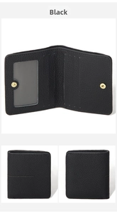 Interior detail of black RFID leather wallet with card slots and golden snap button