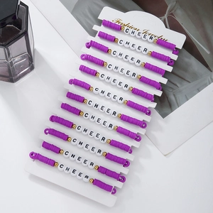 Detailed set of 12 purple Heishi clay bead cheer bracelets on a jewelry display card