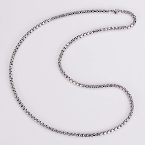 Detailed view of silver stainless steel box chain necklace with polished square links