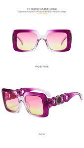 Detail view of square gradient purple frames with chain-style arms and Greek key metal accent