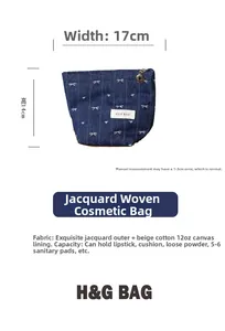 Macro view of blue denim cosmetic bag with bow patterns and dimensions 17x14cm