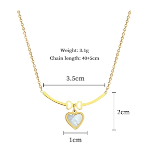 Detail view of gold butterfly and heart pendant necklace with dimensions and weight