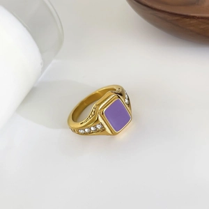 Elegant 18k gold plated stainless steel ring with purple enamel and sparkling crystals