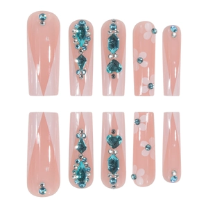 French long coffin press-on nails with pink glitter, floral patterns and blue rhinestones