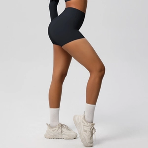 Side view of black high-waisted seamless yoga shorts with matte compression fabric