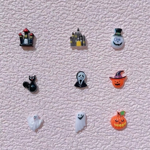 9pcs set of Halloween resin nail charms including pumpkin, ghost, black cat and castle