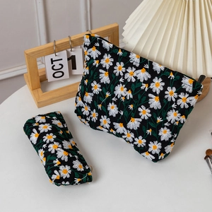 Floral embroidered canvas cosmetic bag and pencil case set with white daisy pattern