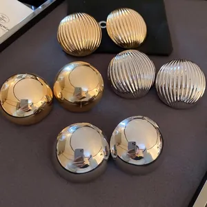 Textured striped and smooth metallic half-round dome stud earrings in gold and silver set