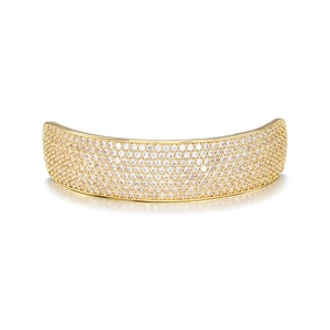 Detailed close-up of hip hop teeth grillz with micro-paved white zircons on a gold base