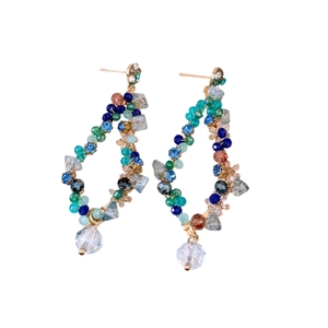 Exquisite drop earrings with colorful beaded tassels and multifaceted crystals in gold metal