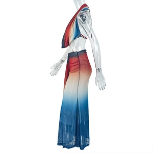 Detail of red white and blue gradient mesh two-piece set with halter top and slit maxi skirt