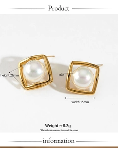 Detail shot of square gold pearl earrings with dimensions 20mm x 15mm and 8.2g weight