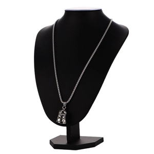 Vintage stainless steel eagle bell pendant necklace for men on a black jewelry mannequin