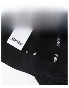 Detail of the widened sweatband and brand labels inside the vintage black baseball cap