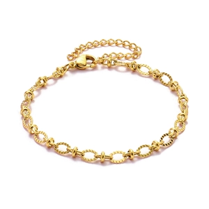 Detailed view of golden paperclip chain bracelet with lobster clasp and extender