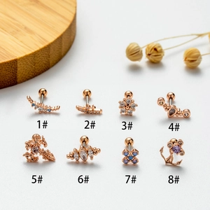 Rose gold stainless steel stud earrings set with crystal flower and anchor designs