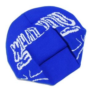 Close-up of blue knitted beanie featuring white jacquard letter patterns and thick texture