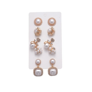 Ten-piece vintage pearl and rhinestone earring set featuring square and round designs