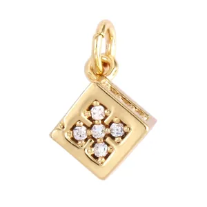 Close-up of gold starburst pendant with white zircon inlays and detailed dimensions