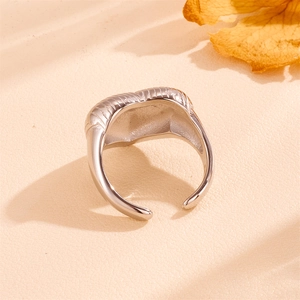 Minimalist adjustable heart stripe ring in silver stainless steel with textured finish