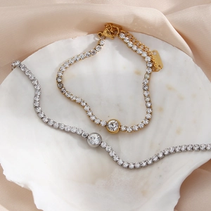 Elegant 18K gold and silver tennis bracelets with round zircon in a shell setting