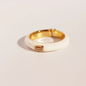 Adjustable white enamel ring with a rectangular zircon stone and gold-plated metal trim