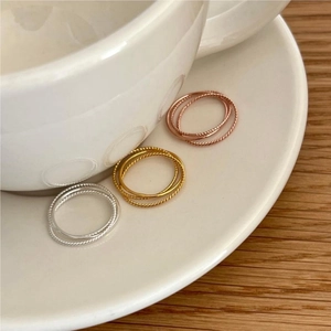 Three-piece 925 sterling silver twisted rope ring set in gold, silver and rose gold