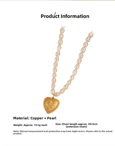 Detail of elegant pearl necklace with engraved heart rose pendant and size parameters