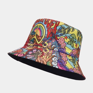Detail of hippie style canvas bucket hat with flower power print and peace sign symbols