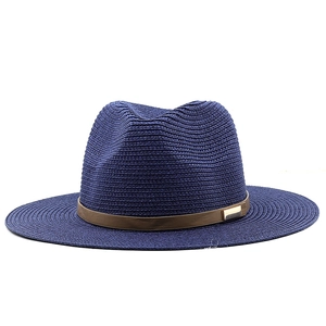 Elegant wide brim straw fedora hat in navy blue with stylish leather band and buckle
