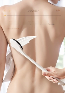 Long handle lotion applicator for easy skin care application on hard to reach back areas