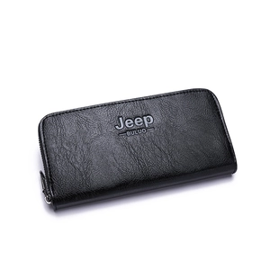 Close-up of litchi-grain leather texture and embossed logo on black long men's wallet