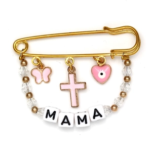 Detail of gold safety pin brooch with MAMA beads and pink butterfly heart charms