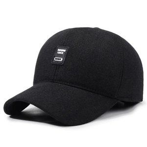 Winter wool blend baseball cap for men featuring a 45-degree angle and ear flaps