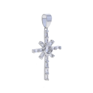 Macro detail of silver hip hop cross pendant with clear zircon stones and shiny metal finish