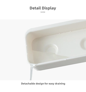Close-up of the detachable white umbrella rack tray showing water draining efficiently