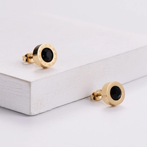 Elegant gold plated stainless steel stud earrings with black shell and Roman numerals
