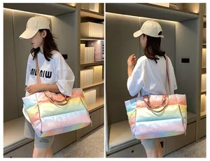 Rainbow gradient quilted travel tote with metallic finish and adjustable shoulder strap