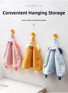 Detailed view of three cartoon coral fleece hand towels with hanging loops and hooks