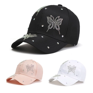 Detailed comparison of baseball caps in black, pink, and white with sparkling rhinestones