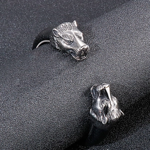 Punk style stainless steel wolf head cuff bracelet with textured black leather strap