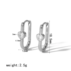Detail view of U-shaped silver earrings with heart zircon and dimension measurements